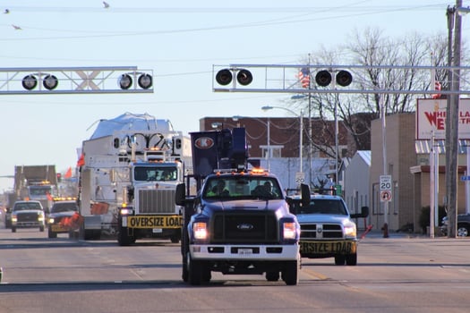 Bucket truck transportation services for 2,500-mile route.