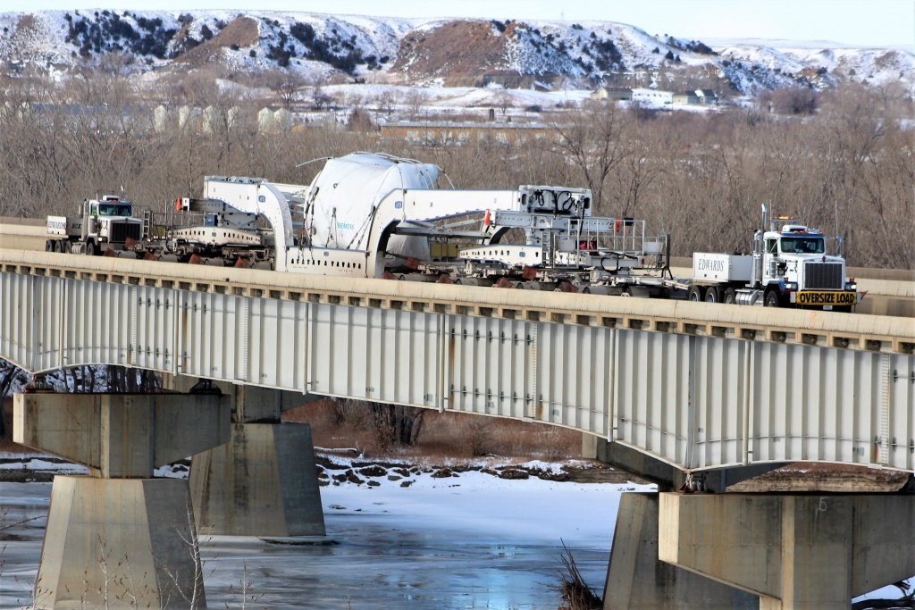 One of two superloads Kenco Bucket Trucks is escorting to Canada.